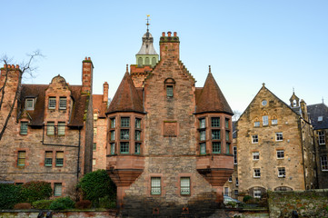 Naklejka premium View on old houses in Dean village in New Town part of Edinburgh city, capital of Scotland, in sunny winter day