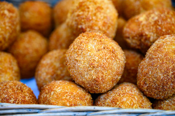Traditional street food in UK, stuffed Scottish eggs with breadcrumbs