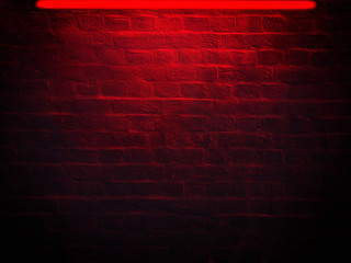 Dark brick wall lit by neon light. Vintage background