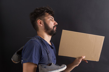 homeless tramp with a sign