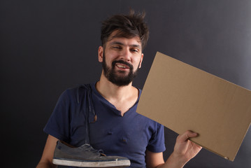 homeless tramp with a sign