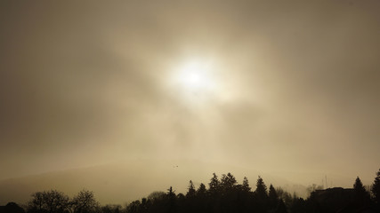 Warm clouds and haze in sun light 