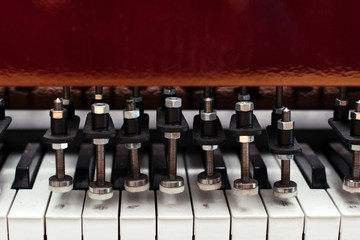 Fototapeta na wymiar Piano construction. Piano various internal details. Piano keys. Musical instrument.