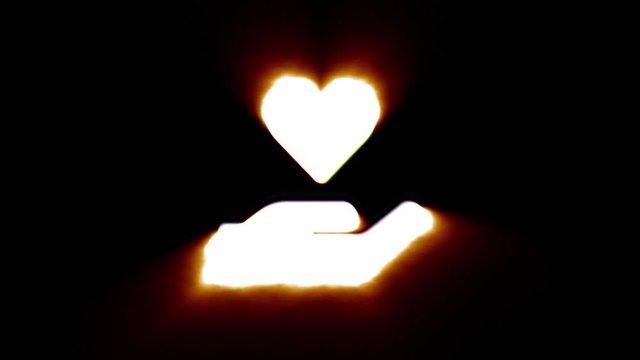 Shiny fire heart in hand icon fly in center flickers with rgb spectrum colors and flies away with light trail. Super bright white symbol in motion isolated on black background. 4k 60 fps footage.