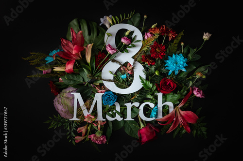 Colorful 8 March. Floral Greeting card. Happy Women's Day. Flower and leaves flat lay spring holiday background, space for text. Nature Trendy Design. Happy Mother's Day.