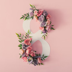 Colorful 8 March. Floral Greeting card. Happy Women's Day. Flower and leaves flat lay spring holiday background with number 8. Nature Trendy Design. Happy Mother's Day. - 319728295