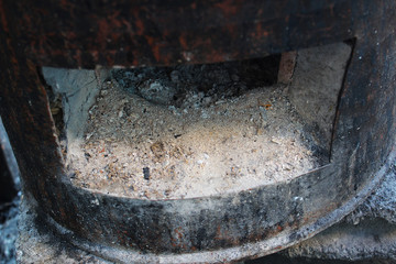 Ashes in the charcoal stove
