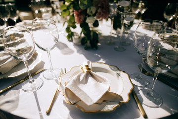 elegant table set, Table decoration at the wedding ceremony in the summer garden, catering service outdoor