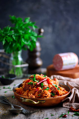 Dominican rice with vegetables and sausages