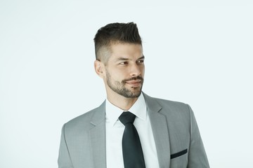 Portrait of businessman against white background