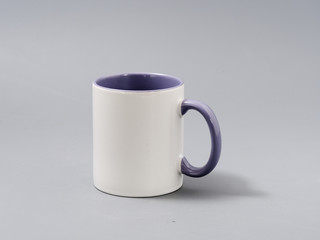 colored cups for sublimation in composition on a gray background