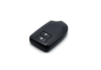Smart car key with remote control for lock and unlock car isolated on white background.