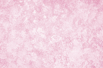 sponge painted pink wall background with mottled paint texture pattern