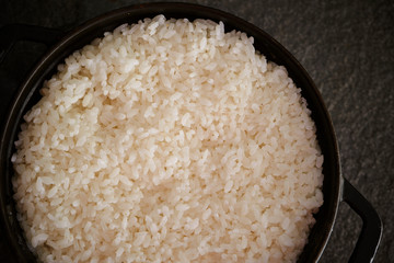 Steamed rice in iron pot 