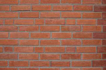 Old red brick wall, stonewall pattern texture background.