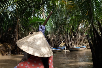 Canoeing in Mekong river delta Vietnam