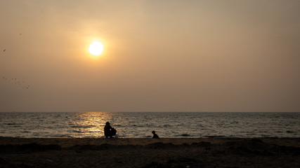 Naklejka na ściany i meble Sunset at Lighthouse beach Kochi India