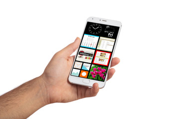 Smart phone app, hand holding mobile phone isolated against white background