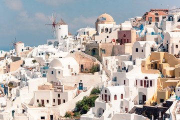 Fototapeta premium Classical casual view on the decoration and architecture of Oia village Santorini at sun weather