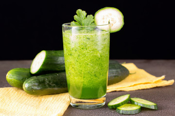Glass of fresh cucumber juice. Green smoothie. Detox water. Healthy drink.