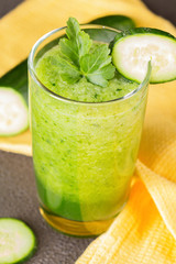 Glass of fresh cucumber juice. Green smoothie. Detox water. Healthy drink.