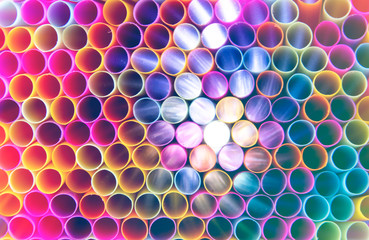 Close up to plenty colorful straws background