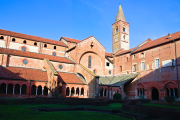 Staffarda, Piedmont, Italy - January 20, 2020: View of the cloister and internal court of the...