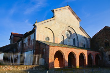 Revello, Piedmont, Italy - January 12, 2020: Facade of the Staffarda abbey, a Cistercian monastery...