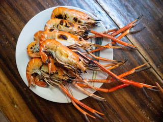 Burnt shrimp on the plate