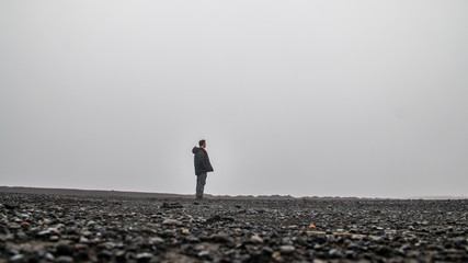 Man standing in the middle of nowhere