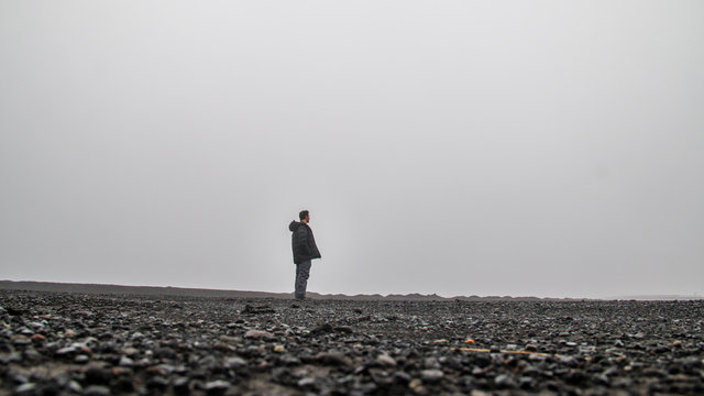 Man Standing In The Middle Of Nowhere