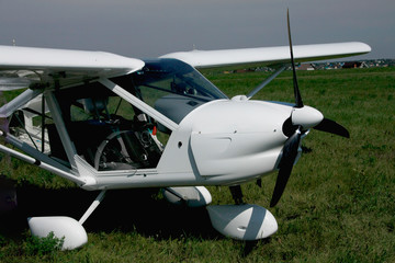 Light Aircraft At The Airport With A Propeller