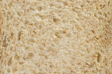 Close-up of healthy whole wheat bread for background texture.