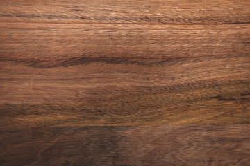 Brown wood texture background coming from natural tree. Abstract wooden panel with beautiful patterns.Background for interior design. 