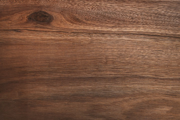 Naklejka premium Brązowe drewno tekstury tła pochodzące z naturalnego drzewa. Streszczenie drewniany panel z pięknymi wzorami. Tło do aranżacji wnętrz.
