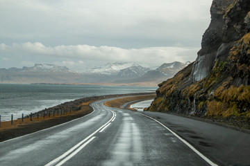 Windy road by the side of the ocean