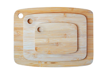 Set of wooden cutting boards isolated on white