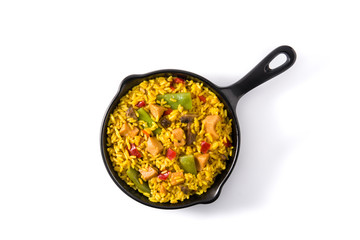 Fried rice with chicken and vegetables in frying pan isolated on white background. Top view