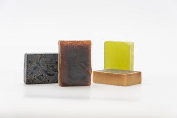 Various seated handmade artisan soaps