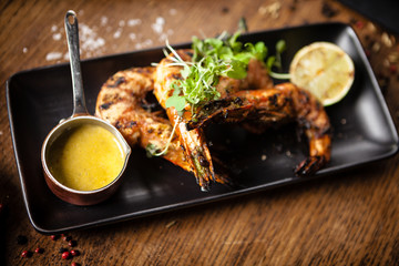 Grilled tiger prawns with chilli sauce and lime