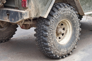 dirty old wheels and off-road suspension close-up