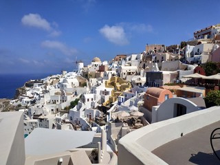 Classical view on the decoration and architecture of Oia village Santorini at sun weather