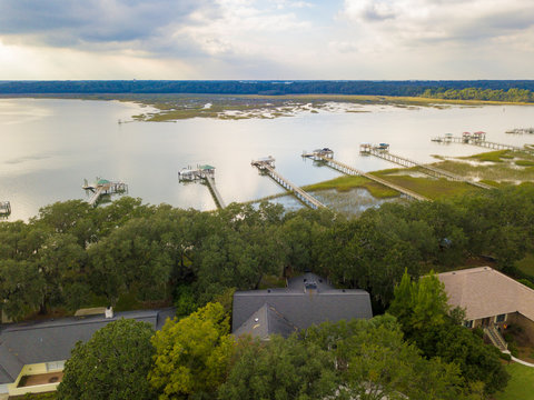 Aerial view of coastal waterfront homes with docks in South Carolina.
