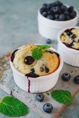 Homemade Blueberry Muffin for one baked in a ramekin, selective focus