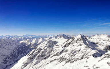 Swiss alpine Jungfrau peak and highland landscape panorama of Bern Highland helicopter view