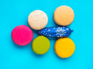 Closeup assortment of lots of multicolored tasty macarons, Christmas tree shape made of tasty macarons