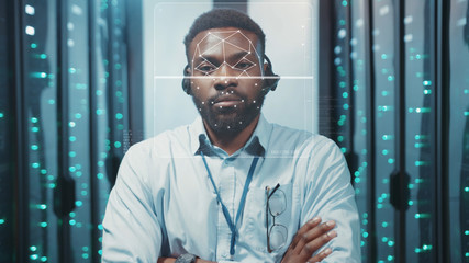 Face Detection. Human Face ID. Biometric 3D Animated Portrait of African IT Administrator Working in Data Center Server Cabinet. Technological Identification of Man Face in Security Room. Concept of