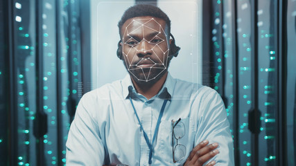 Face Detection. Human Face ID. Biometric 3D Animated Portrait of African IT Administrator Working in Data Center Server Cabinet. Technological Identification of Man Face in Security Room. Concept of