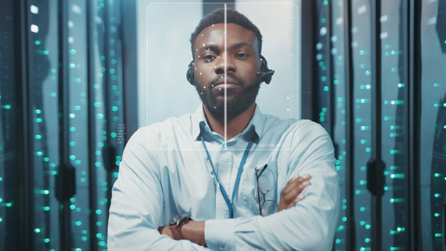 Face ID. 3D Facial Recognition. Face Detection. Biometric Futuristic Security Scan. Technological Scanning of Black Data Center Specialist Face in High Tech Server Room. Artificial Intelligence