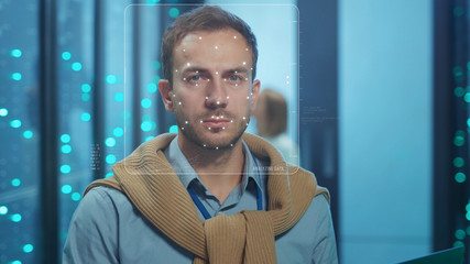 Face Detection. Futuristic Facial Recognition. Face ID. Biometric 3D Data Identification of IT Server Engineer Working at Database Center. Looped Face Animation with Dots and Lines. Augmented Reality